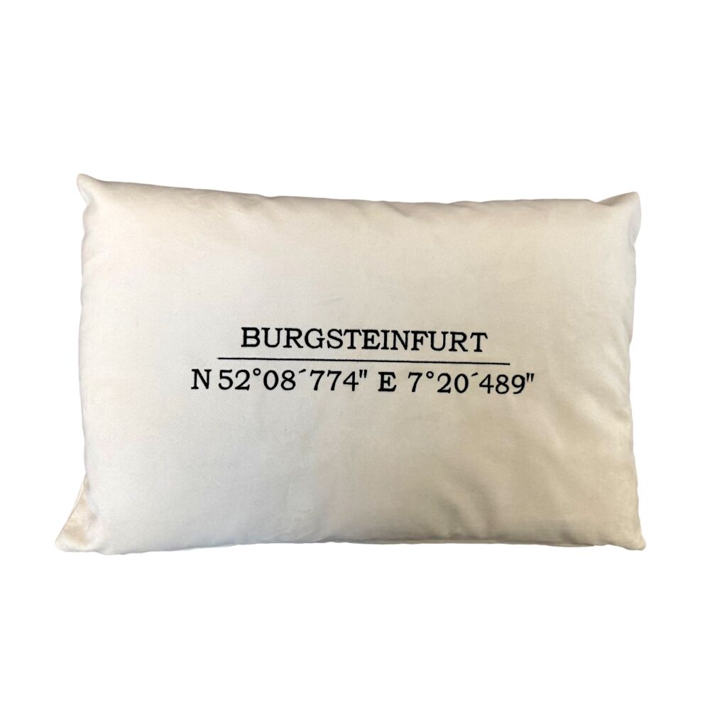 Kissen mit eingestickten Koordinaten 